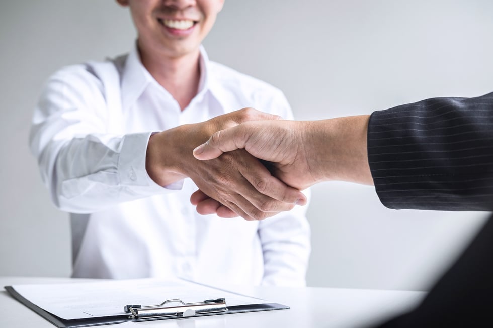 Boss Congratulating New Hire